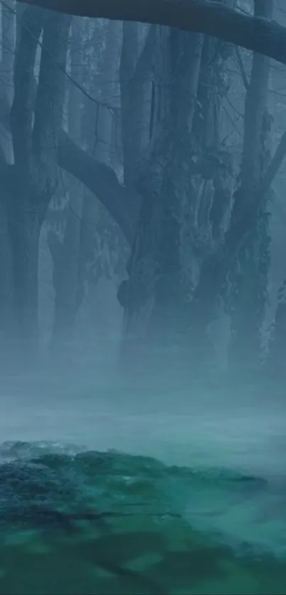 Mystical forest wallpaper with foggy trees and a hint of teal green water.