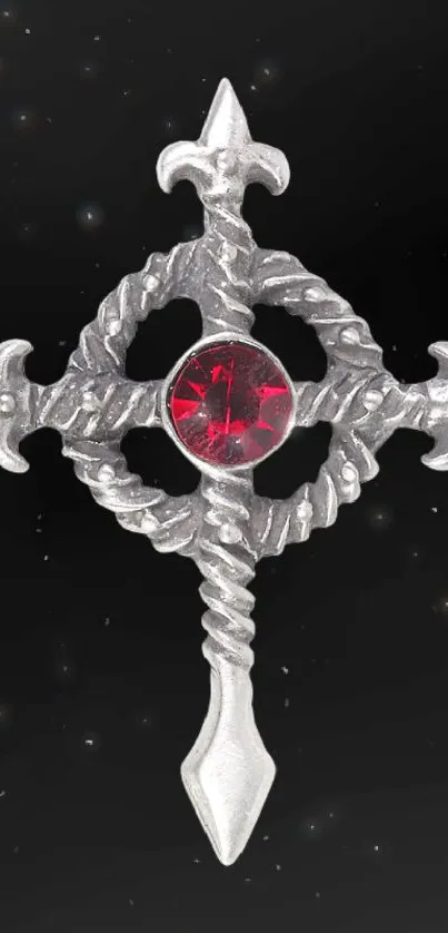 Mystical silver daggers with red and blue gemstones on wallpaper.