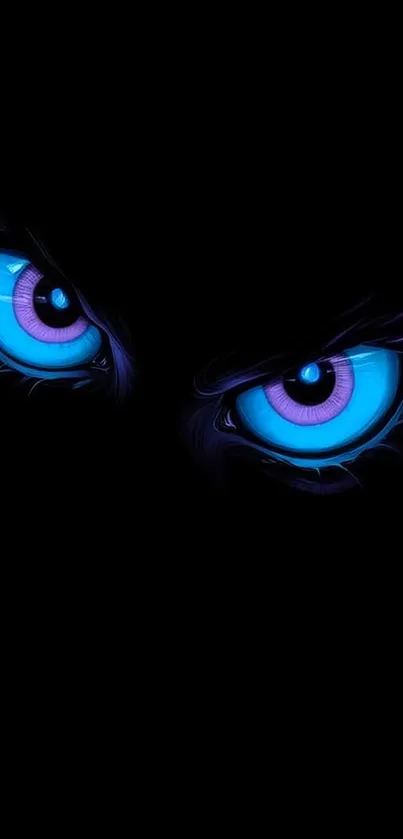 Mystical glowing eyes with blue and purple hues on a dark background.