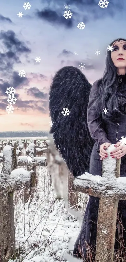 Gothic angel with black wings in a snowy graveyard at sunset.