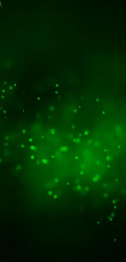 Abstract green particles glowing on a dark background in this modern mobile wallpaper.