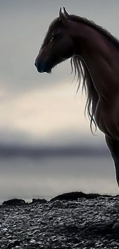 Mystical horse standing by a moody shore with a dramatic gray sky backdrop.