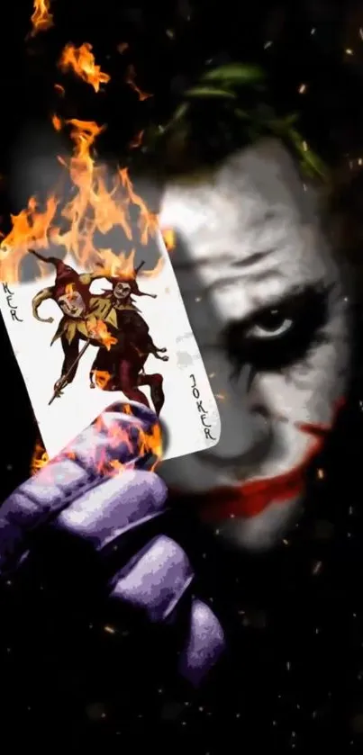 Joker holding a flaming card art wallpaper