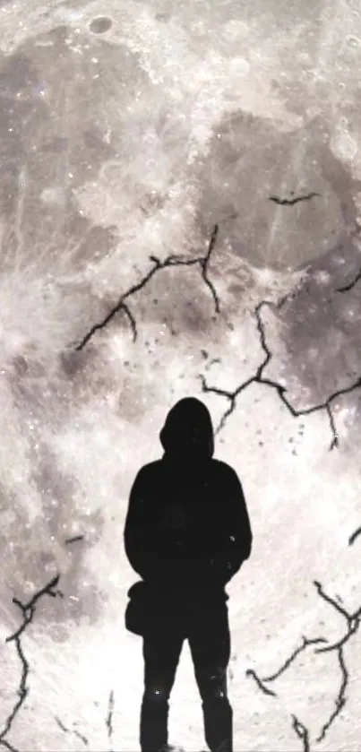 Silhouette standing against a cracked lunar background.