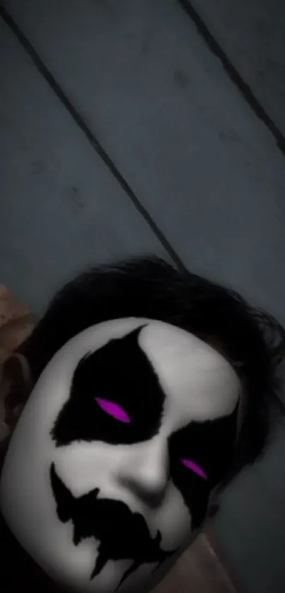 Dark mystical mask with purple glowing eyes.