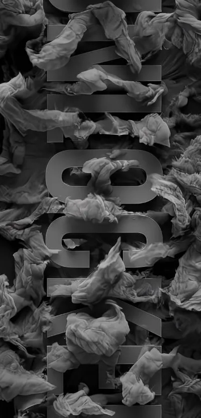 Dark monochrome wallpaper with abstract textures and bold text.
