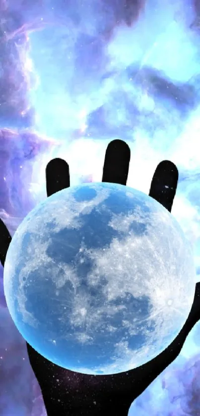 Hand holding a glowing moon with cosmic background in blue hues.