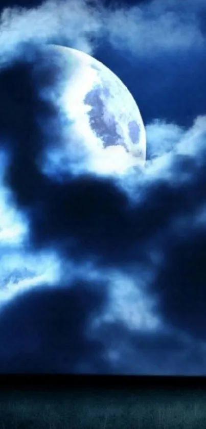 Moonlit night sky with dark blue clouds and glowing full moon.