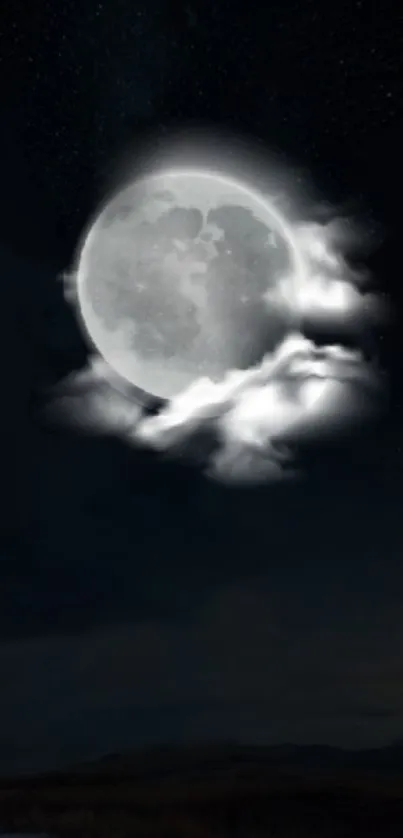 Full moon in cloudy night sky wallpaper.