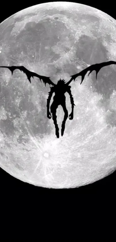 Silhouette figure with wings against full moon.