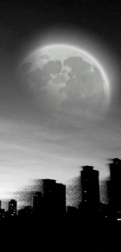 Black and white wallpaper of a moonlit city skyline at night.