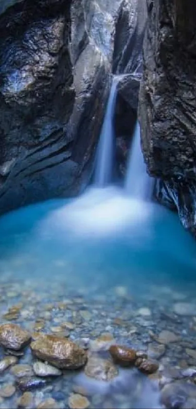 Blue waterfall flowing through a rocky mountain gorge with serene surroundings.