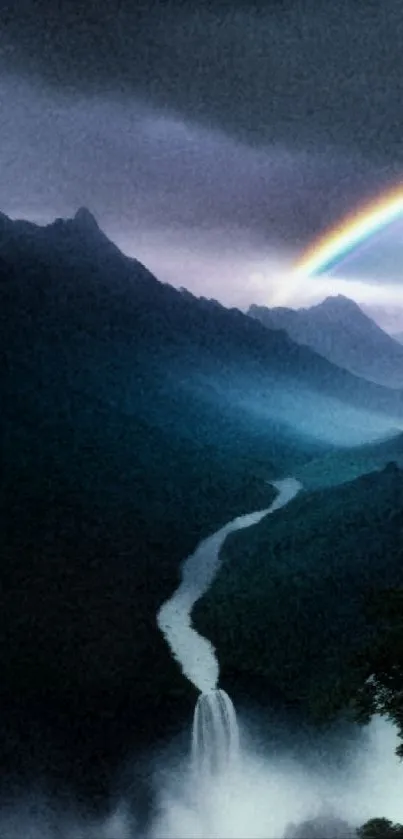 Mystical mountain scene with a rainbow and waterfall.