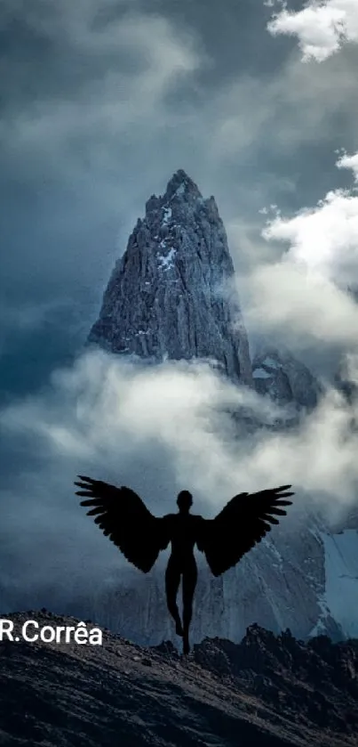 Silhouette with wings in front of a cloudy mountain peak under a moody sky.