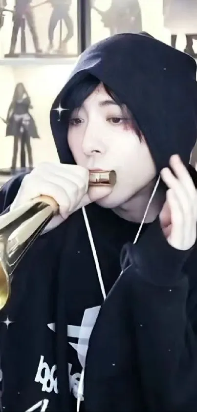 Musician in black hoodie playing trumpet passionately.