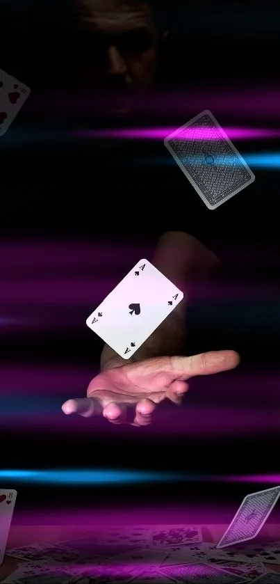 Hand performing card trick with floating neon cards in a dark setting.