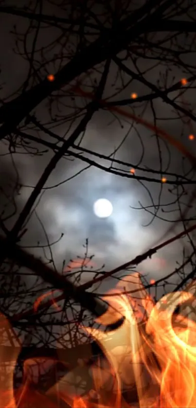 Silhouetted branches with flames and a moonlit sky.