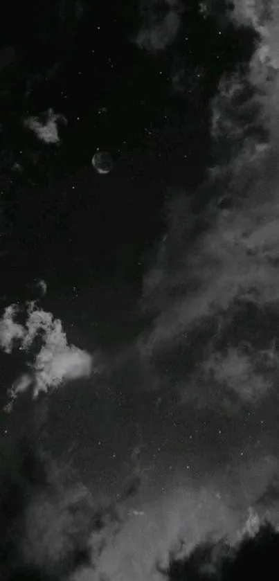 Mystical night sky with clouds and stars in a black and white wallpaper.