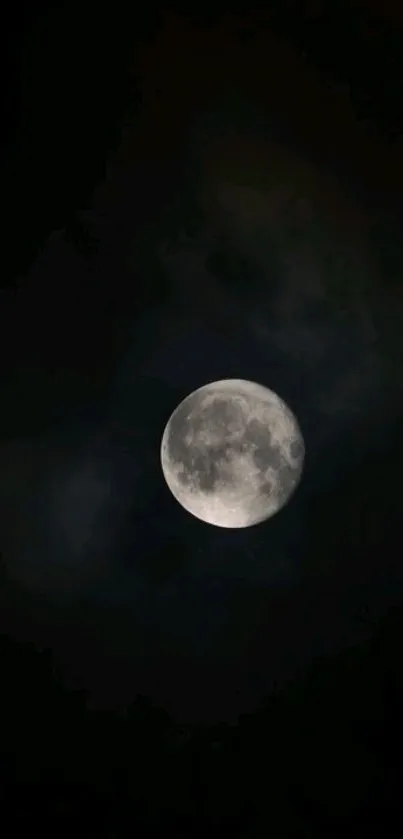 Moon illuminated against a dark sky wallpaper.