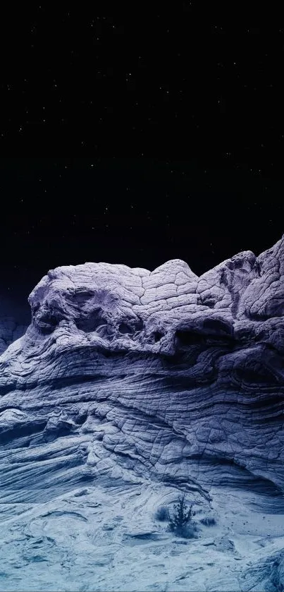 Mystical nightscape wallpaper with starry sky and rocky formations under dark blue hues.