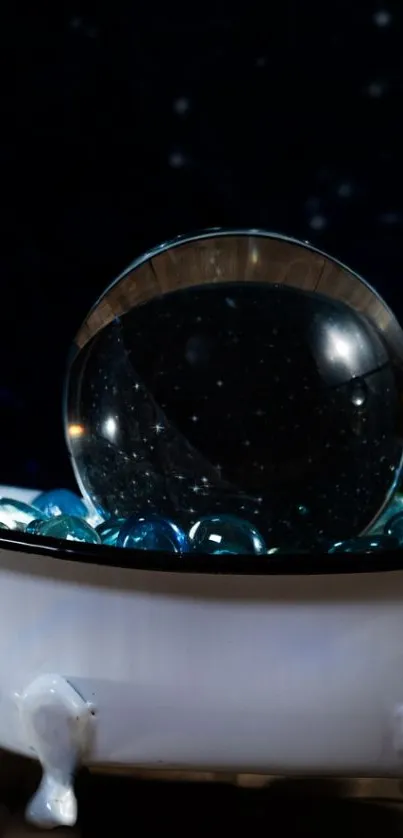 Mystical orb on blue stones with a starry sky background in a small white dish.