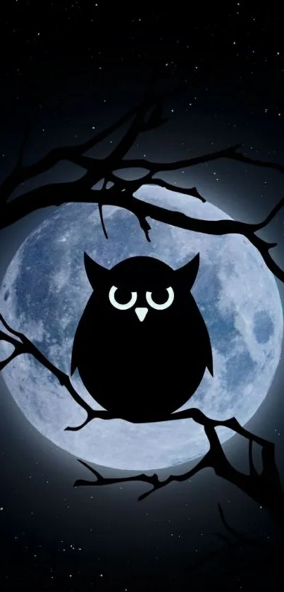 Owl silhouette in front of large moon on a dark starry night.