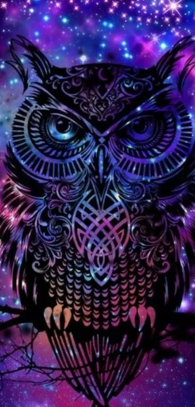 Mystical owl in a vibrant, starry galaxy wallpaper.