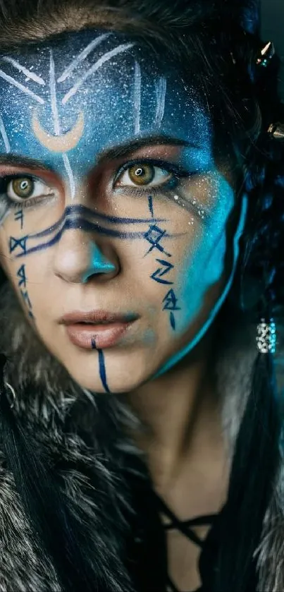 Mystical face with blue paint and symbols.