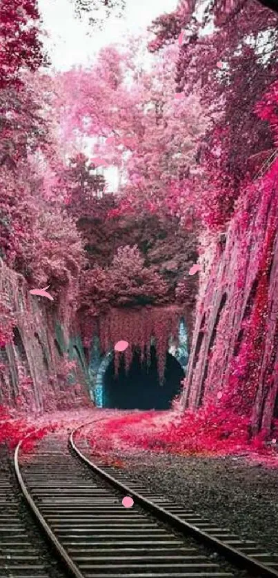 Enchanting railway through vibrant pink forest foliage.