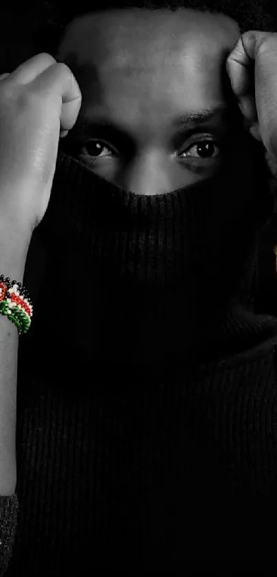 Black and white portrait with colorful bracelets.