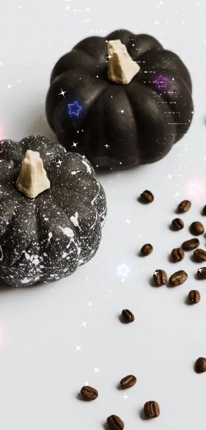 Black pumpkins and coffee beans with a starry effect on a wallpaper.