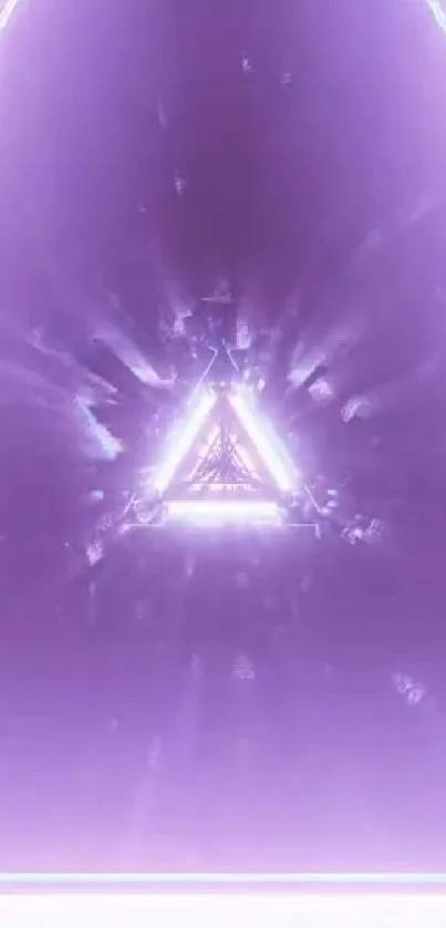 Mystical purple triangle with a glowing neon effect on a digital wallpaper.