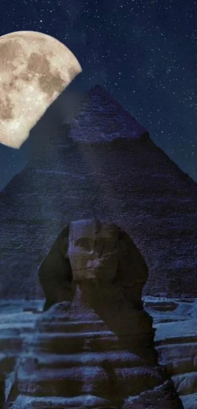 Pyramid and Sphinx under a full moon night sky.