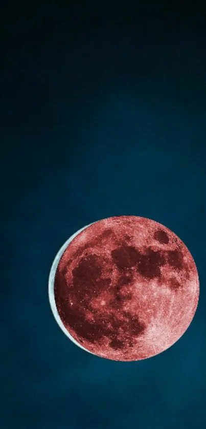 Mystical red moon on deep midnight blue background.