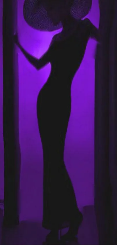 Silhouette of a woman in purple light creating a mystical ambiance.