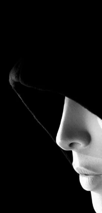 Mysterious silhouette in a black hooded design on mobile wallpaper.