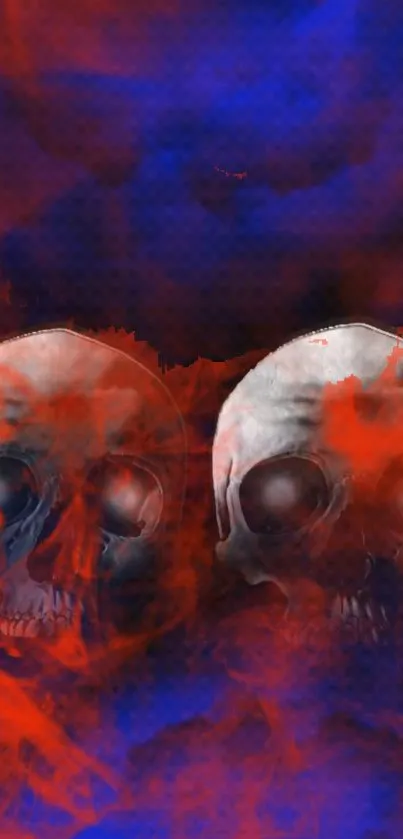 Red and blue skulls in mystical mist wallpaper.