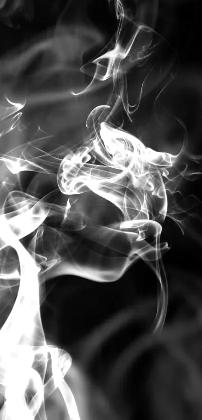 Mystical abstract smoke against black background.