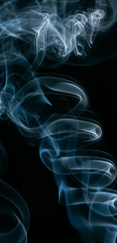 Mystical blue smoke art on dark background.