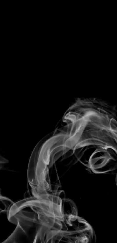 Mystical smoke swirls on black background wallpaper.