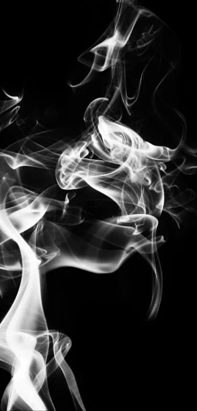 Mystical white smoke on black background wallpaper.