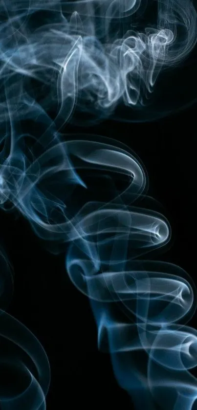 Ethereal blue smoke swirls on dark background, creating a mystical appearance.