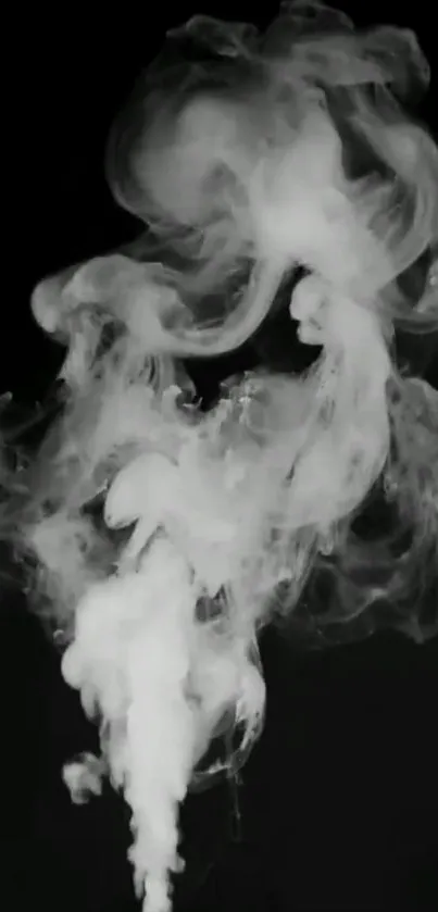 Mystical smoke swirling on black background wallpaper.