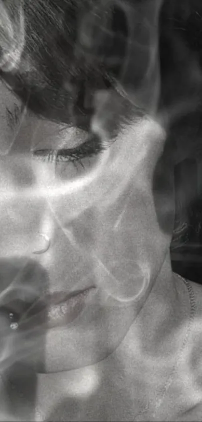 Black and white portrait with mystical smoke effects.