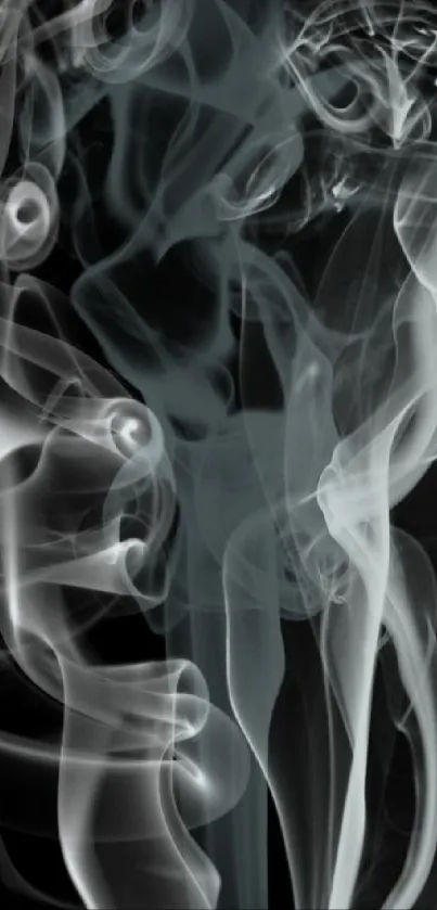 Mystical swirling gray smoke on dark background wallpaper.