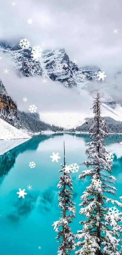 Snowy mountain landscape with turquoise lake reflecting serene beauty.