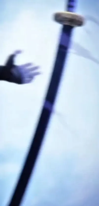 Mystical hand reaching for a sword under blue tones.