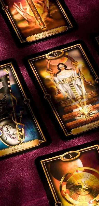 Mystical tarot cards laid out with purple background.