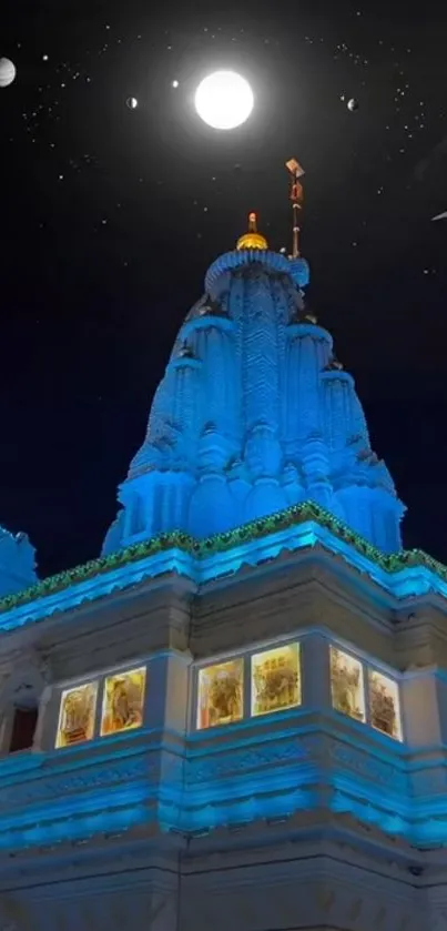 Temple under a starlit night sky with illuminated blue hues.