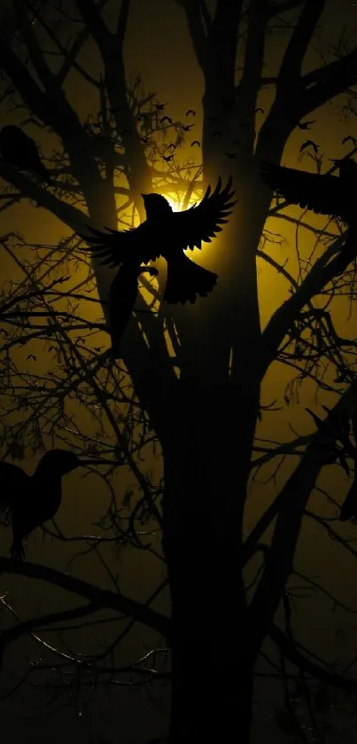 Silhouetted birds on a mystical tree with a glowing night background.